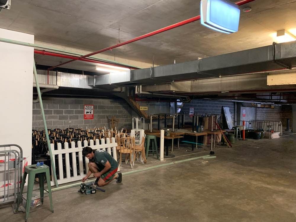 Secure storage lock-up: Before: open car park bay