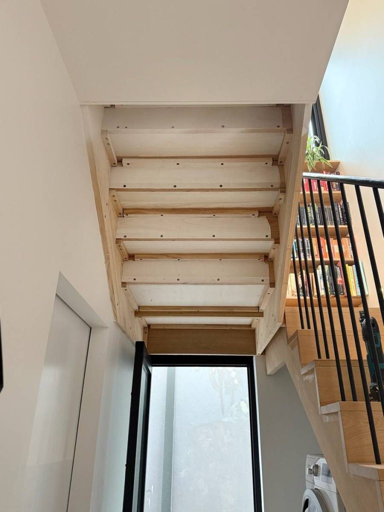 Custom fit-outs and outdoor living: Complete: understairs panelling