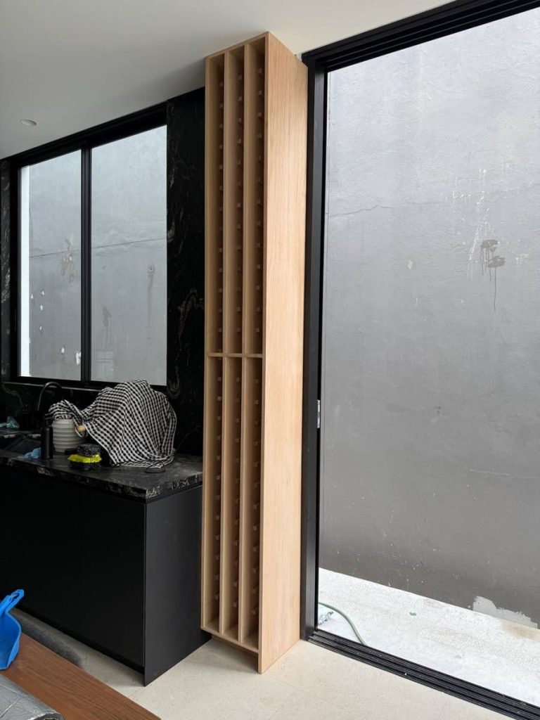 Custom fit-outs and outdoor living: Complete: stone and oak batten wall